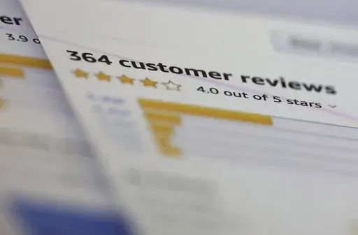 In this April 17, 2019, file photo, online customer reviews for a product are displayed on a computer in New York. Some of the most used platforms for travel and online shopping said Tuesday, Oct. 17. 2023 they’re going to team up to battle fake reviews. Amazon, reviews site Glassdoor and Trustpilot as well as travel companies Expedia Group, Booking.com and Tripadvisor announced they're launching a group called the “Coalition for Trusted Reviews." (AP Photo/Jenny Kane, File)