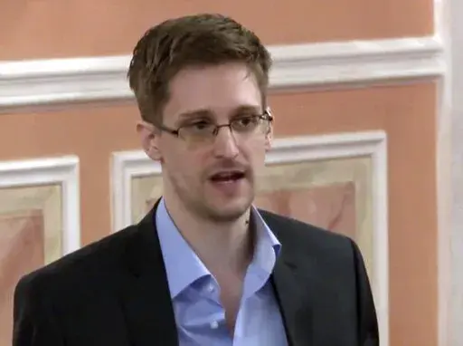 In this image made from video and released by WikiLeaks, former National Security Agency systems analyst Edward Snowden speaks in Moscow, Oct. 11, 2013. President Vladimir Putin has granted Russian citizenship to former U.S. security contractor Edward Snowden, according to a decree signed by the Russian leader on Monday Sept. 26, 2022.  (AP Photo, File)