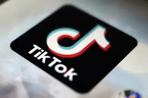 The TikTok app logo appears in Tokyo, on Sept. 28, 2020. News outlets are warning of a deadly TikTok challenge that involves people jumping off speeding boats however, the Alabama Law Enforcement Agency told The Associated Press it has investigated six boating and marine-related deaths this year and none were tied to TikTok trends. The social media company also said it has seen no such challenge on its platform. (AP Photo/Kiichiro Sato, File)