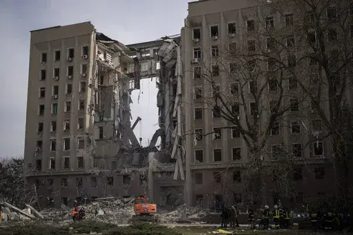 The regional government headquarters of Mykolaiv, Ukraine, following a Russian attack, on Tuesday, March 29, 2022. Ukrainian President Volodymyr Zelenskyy says seven people were killed in a missile strike on the regional government headquarters in the southern city of Mykolayiv. (AP Photo/Petros Giannakouris)