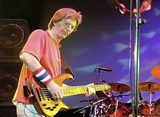 Phil Lesh, of The Grateful Dead, performs during a reunion concert in East Troy, Wis. on Aug. 3, 2002. Lesh, a founding member of the Grateful Dead, died Friday, Oct. 25, 2024, at age 84. (AP Photo/Morry Gash, File)