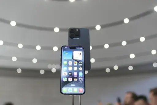 The iPhone 15 Pro is displayed during an announcement of new products on the Apple campus, Tuesday, Sept. 12, 2023, in Cupertino, Calif. (AP Photo/Jeff Chiu)