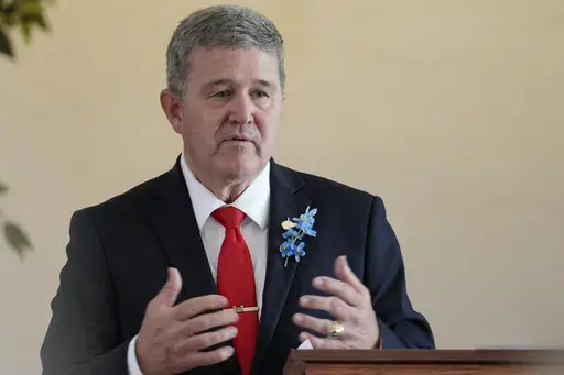 West Virginia gubernatorial candidate Mac Warner speaks to supporters at a campaign event at the Charleston Women's Club in Charleston, W.Va., Thursday, May 4, 2023. Secretary of State Mac Warner and Attorney General Patrick Morrisey say they remain concerned U.S. President Joe Biden's victory was not legitimate. That's despite repeated investigations, audits and court cases concluding there was no evidence of widespread voter fraud or improper counting that could have changed the results. (AP P