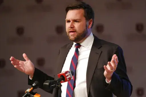 J.D. Vance, a Republican running for an open U.S. Senate seat in Ohio, speaks to reporters following a debate with other Republicans at Central State University in Wilberforce, Ohio, Monday, March 28, 2022. (AP Photo/Paul Vernon)