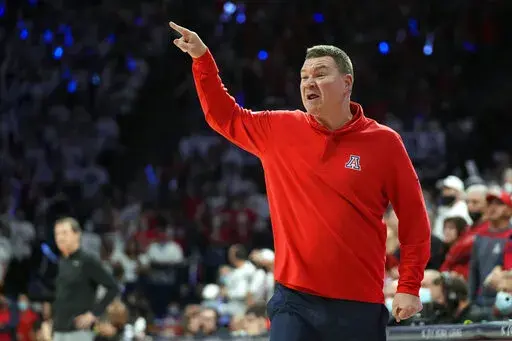 Arizona coach Tommy Lloyd reacts to a play during the second half of the team's NCAA college basketball game against Oregon, Saturday, Feb. 19, 2022, in Tucson, Ariz. Arizona won 84-81. (AP Photo/Rick Scuteri)