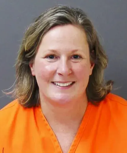 FILE-This inmate file photo provided by the Minnesota Department of Corrections on Thursday, Dec. 23, 2021, shows former Brooklyn Center Police officer Kim Potter. Potter was convicted on Thursday of two manslaughter charges in the killing of Daunte Wright, a Black motorist she shot during a traffic stop after she said she confused her gun for her Taser. (Minnesota Department of Corrections via AP, File)