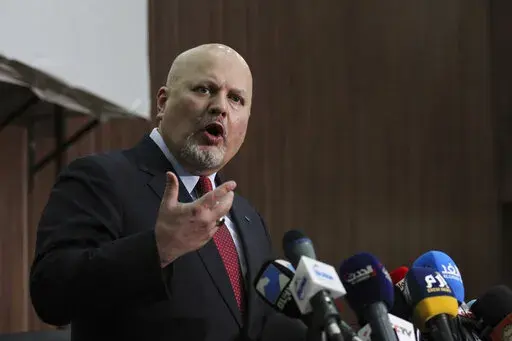 Karim Ahmed Khan, International Criminal Court chief prosecutor, speaks during a news conference at the Ministry of Justice in the Khartoum, Sudan, Aug. 12, 2021. Representatives of a group of nations working together to investigate war crimes committed since Russia's invasion of Ukraine are meeting Tuesday, May 31, 2022 in The Hague amid ongoing calls for those responsible for atrocities to be brought to justice. Tuesday's coordination meeting at the European Union's judicial cooperation agency