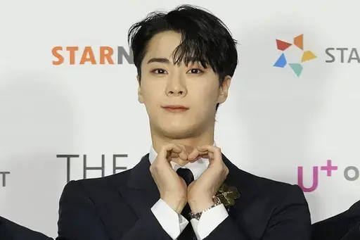 Moon Bin, a member of K-Pop group ASTRO, poses for photos on the red carpet for the 2021 Asia Artist Awards in Seoul, South Korea, Dec. 2, 2021. Moon Bin was found dead at his home in Seoul, his management agency said Thursday, April 20, 2023. (AP Photo/Lee Jin-man, File)
