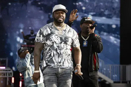 50 Cent, left, and Tony Yayo perform at the Wireless Music Festival in Finsbury Park, July 9, 2023, in London. Rapper 50 Cent said Monday, Aug. 28, that his scheduled show Tuesday night, Aug. 29, at Talking Stick Resort Amphitheatre, an outdoor venue in west Phoenix, was postponed because of the sweltering weather. (Scott Garfitt/Invision/AP, File)