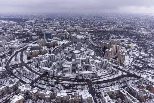 An aerial view on the center of Kharkiv, Ukraine's second-largest city, Saturday, Jan. 29, 2022. The situation in Kharkiv, just 40 kilometers (25 miles) from some of the tens of thousands of Russian troops massed at the border of Ukraine, feels particularly perilous. Ukraine's second-largest city is one of its industrial centers and includes two factories that restore old Soviet-era tanks or build new ones. (AP Photo/Evgeniy Maloletka)