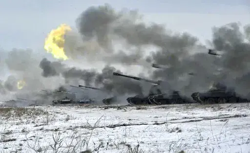 In this image taken from video and released by Russian Defense Ministry Press Service, Russian army's self-propelled howitzers fire during military drills near Orenburg in the Urals, Russia, Thursday, Dec. 16, 2021. With tens of thousands of Russian troops positioned near Ukraine, the Kremlin has kept the U.S. and its allies guessing about its next moves in the worst Russia-West security crisis since the Cold War. (Russian Defense Ministry Press Service via AP, File)