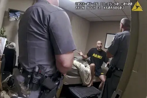 In this image taken from New York State Police body camera video that was obtained by WMTW-TV 8 in Portland, Maine, New York State police interview Army Reservist Robert Card, the man responsible for Maine's deadliest mass shooting, at Camp Smith in Cortlandt, New York on July 16, 2023. Army officials will testify Thursday, March 7, 2024 before a special commission investigating the deadliest mass shooting in Maine history, which was committed by a former reservist. (WMTW-TV 8/New York State pol