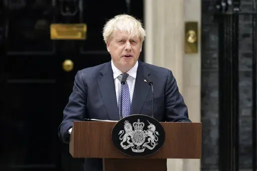 British Prime Minister Boris Johnson speaks to media next to 10 Downing Street in London, Thursday, July 7, 2022. Prime Minister Boris Johnson has agreed to resign, his office said Thursday, ending an unprecedented political crisis over his future that has paralyzed Britain's government. An official in Johnson's Downing Street office confirmed the prime minister would announce his resignation later. The official spoke on condition of anonymity because the announcement had not yet been made. (AP 