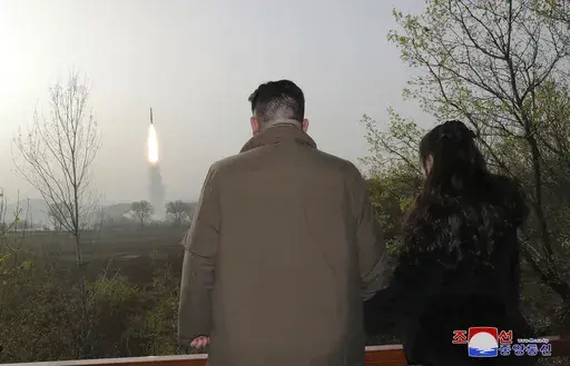 This photo provided April 14, 2023, by the North Korean government, shows North Korean leader Kim Jong Un, center, inspects what it says is the test-launch of Hwasong-18 intercontinental ballistic missile Thursday, April 13, 2023 at an undisclosed location, North Korea. Independent journalists were not given access to cover the event depicted in this image distributed by the North Korean government. The content of this image is as provided and cannot be independently verified. Korean language wa