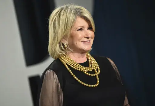 Martha Stewart arrives at the Vanity Fair Oscar Party, Feb. 9, 2020, in Beverly Hills, Calif. At 81, Stewart isn't slowing down and some might say she's heating up as one of Sports Illustrated's 2023 cover models. In an Instagram post Monday, May 15, 2023, the businesswoman and media personality wrote she hopes the cover inspires people “to try new things, no matter what stage of life you're in.” (Photo by Evan Agostini/Invision/AP, File)