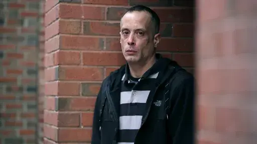 David Meehan, lead plaintiff in a class-action lawsuit accusing the State of New Hampshire of covering up decades of sexual, physical and emotional abuse at its youth detention center, poses for a photo outside his lawyer's office in Portsmouth, N.H., Friday, Jan. 10, 2020. The class-action suit was later dismissed, but Meehan’s individual case goes to trial Tuesday, April 9, 2024, in Rockingham County Superior Court. (AP Photo/Charles Krupa, File)