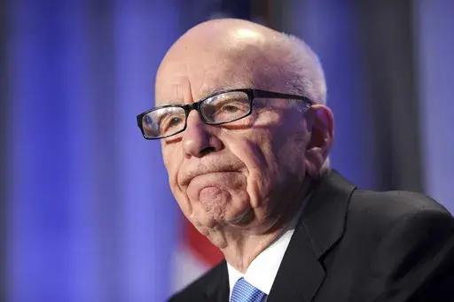 In this Oct. 14, 2011, file photo, News Corp. CEO Rupert Murdoch delivers a keynote address at the National Summit on Education Reform in San Francisco. Murdoch stirs mixed feelings in Britain, where he transformed the media over half a century. U.K. journalists and politicians are both hailing and reviling the 92-year-old mogul after he announced he was stepping down as leader of his media empire. (AP Photo/Noah Berger, File)