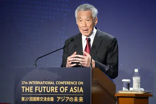 Singapore Prime Minster Lee Hsien Loong delivers a speech at a session of the International Conference on "The Future of Asia" in Tokyo Thursday, May 26, 2022. Singapore announced it will decriminalize sex between men by repealing a colonial-era law while protecting the city-state's definition of marriage. During his speech Sunday, Aug. 21 at the annual National Day Rally, Prime Minister Lee Hsien Loong said he believed it is the “right thing to do now” as most Singaporeans will now accept i
