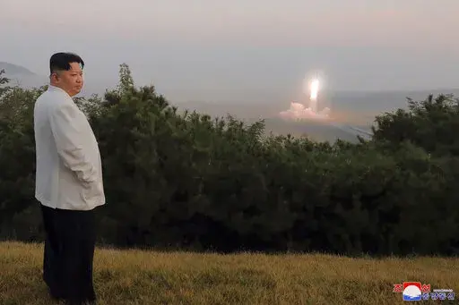 This photo provided on Oct. 10, 2022, by the North Korean government, North Korean leader Kim Jong Un inspects a missile test at an undisclosed location in North Korea, as taken sometime between Sept. 25 and Oct. 9. Independent journalists were not given access to cover the event depicted in this image distributed by the North Korean government. The content of this image is as provided and cannot be independently verified. Korean language watermark on image as provided by source reads: "KCNA" wh