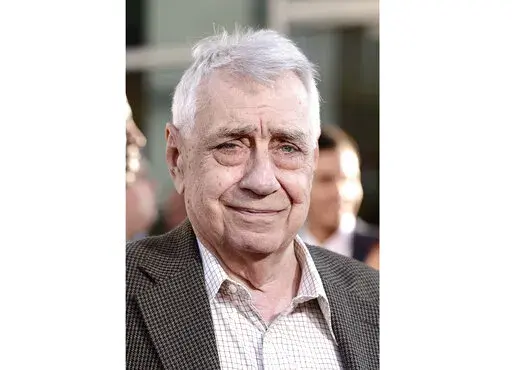 Philip Baker Hall arrives at the premiere of "Clear History" at the Cinerama Dome on Wednesday, July 31, 2013 in Los Angeles. Hall, the prolific character actor of film and theater who starred in Paul Thomas Anderson’s early movies and who memorably hunted down a long-overdue library book in “Seinfeld,” has died. He was 90. Holly Wolfle Hall, the actor’s wife of nearly 40 years, says Hall died Sunday surrounded by loved ones in Glendale, California. (Photo by Dan Steinberg/Invision/AP, F