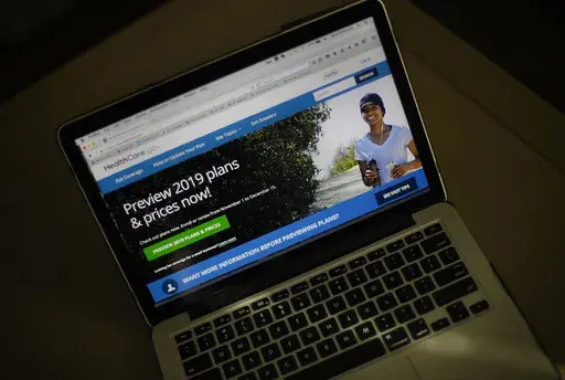 The HealthCare.gov website is photographed in Washington, Wednesday, Oct. 31, 2018. Open enrollment is no one’s idea of a good time, but health coverage is a crucial part of your financial health. Whether you’re getting insurance through an employer or the Affordable Care Act marketplace, it’s important to ask the right questions before you choose a plan for 2024. (AP Photo/Pablo Martinez Monsivais, File)
