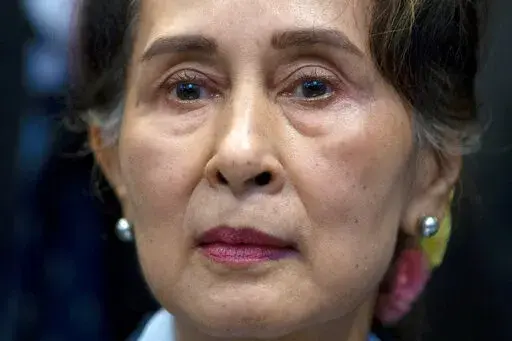 Myanmar's lthen eader Aung San Suu Kyi waits to address judges of the International Court of Justice on the second day of three days of hearings in The Hague, Netherlands, Dec. 11, 2019. Myanmar convicted ousted leader Aung San Suu Kyi on two more corruption counts on Wednesday, Oct. 12, 2022, extending her total prison term to 26 years. (AP Photo/Peter Dejong, File)