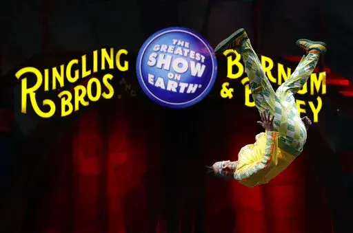 A Ringling Bros. and Barnum & Bailey clown does a somersault during a performance Saturday, Jan. 14, 2017, in Orlando, Fla.  “The Greatest Show on Earth” is making a comeback — without animal acts — five years after shutting down its three-ring circus, Ringling Bros. and Barnum &amp; Bailey announced Wednesday, May 18, 2022. (AP Photo/Chris O'Meara, File)