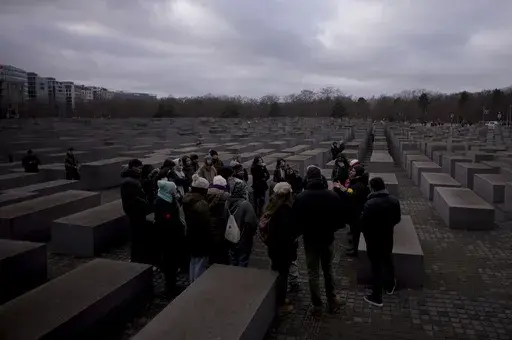 Tourists visit the Holocaust Memorial in Berlin, Germany, on International Holocaust Remembrance Day, on Jan. 27, 2024. More than 250 Holocaust survivors have joined an international initiative to share their stories of loss and survival with students around the world during a time of rising antisemitism following the Oct. 7 Hamas attack on Israel that triggered the war in the Gaza Strip. The Survivor Speakers Bureau was launched Thursday by the New York-based Conference on Jewish Material Claim