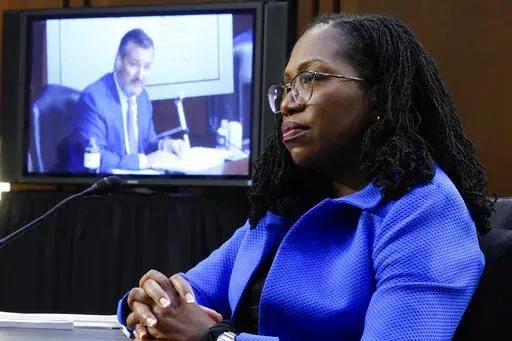 Supreme Court nominee Ketanji Brown Jackson listens as Sen. Ted Cruz, R-Texas, speaks during a Senate Judiciary Committee confirmation hearing on Capitol Hill in Washington, Wednesday, March 23, 2022. (AP Photo/Alex Brandon)