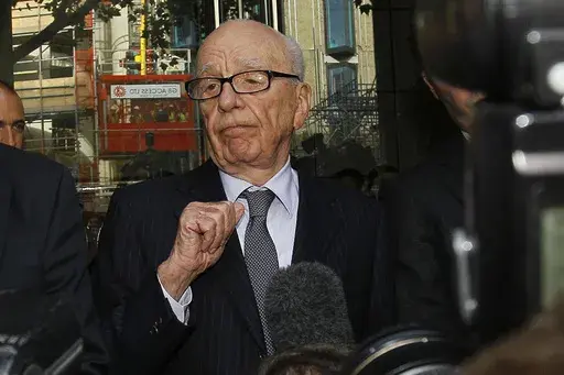 Rupert Murdoch talks with the media after he held a meeting with the parents and sister of murdered school girl Milly Dowler in London, Friday, July 15, 2011. Murdoch, whose 93rd birthday is next week, is planning to get married for the fifth time, wedding Elena Zhukova, his representative said Saturday, March 9, 2024. (AP Photo/Kirsty Wigglesworth, File)