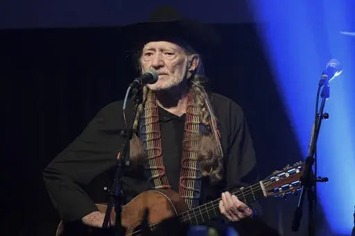 Willie Nelson performs at the Producers & Engineers Wing 12th Annual GRAMMY Week Celebration in Los Angeles on Feb. 6, 2019. The country legend's new book, “Energy Follows Thought,” gives the stories behind his most famous songs. (Photo by Richard Shotwell/Invision/AP, File)