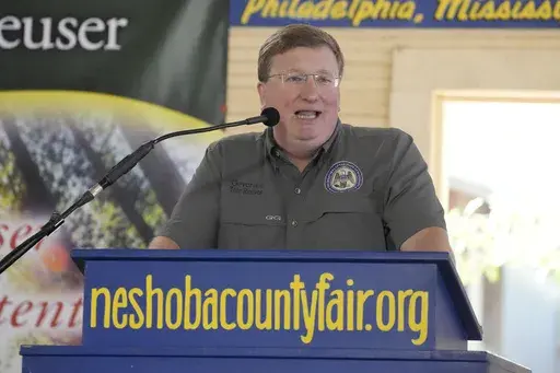 Mississippi Republican Gov. Tate Reeves addresses the crowd at the Neshoba County Fair in Philadelphia, Miss., Thursday, July 27, 2023. Reeves faces two opponents in the party primary Aug. 8, as he seeks reelection. (AP Photo/Rogelio V. Solis)