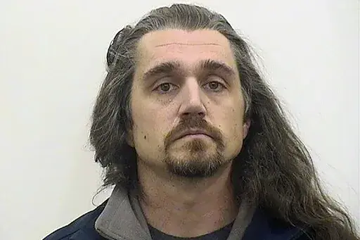 This booking image provided by Adams County, Illl., administration, shows Timothy Bliefnick of Quincy, Ill., who has been charged charged with first-degree murder in the death of his estranged wife, Rebecca Bliefnick. On Friday, Aug. 11, 2023, a judge sentenced Bliefnick, a former contestant on the television game show “Family Feud,” to life in prison after he was convicted of first-degree murder in the slaying of his estranged wife in western Illinois. (Adams County, Illl., Administration v