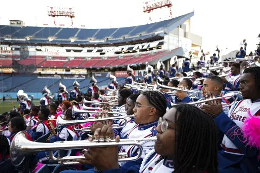 Members of the Tennessee State University marching band, known as the Aristocrat of Bands, perform on Oct. 8, 2022, in Nashville, Tenn. TSU is hoping to make history after their marching band was nominated for a Grammy in the roots gospel category. The historically Black university's Aristocrat of Bands teamed up with gospel songwriter and producer Sir the Baptist last year to record “The Urban Hymnal.” (Garrett E Morris via AP)