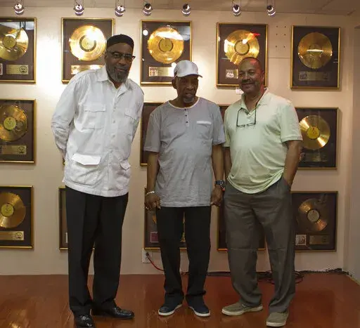 Musicians Kenneth Gamble, left, Leon Huff, center, and Thom Bell stand together at Gamble and Huff Music, on Broad Street, in Philadelphia, on Thursday, May 30, 2013. Bell, the Grammy-winning producer, writer and arranger who helped perfect the “Sound of Philadelphia” of the 1970s with the inventive, orchestral settings of such hits as the Spinners’ “I’ll Be Around” and the Stylistics’ “Betcha by Golly, Wow,” has died at age 79. Bell's wife, Vanessa Bell, said that he died Thur