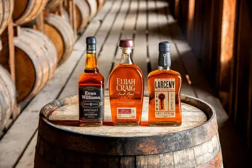 In this photo provided by Heaven Hill Distilleries are Heaven Hill bourbon whiskeys. Heaven Hill Distillery, one of the world’s largest bourbon producers, plans to revive its whiskey production in its Kentucky hometown — more than a quarter century after a devastating fire destroyed a previous production facility. The family-owned and operated spirits company announced plans Wednesday,April 27, 2022, to build a $135 million distillery expected to open by 2024 at Bardstown — in the heart of