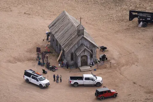 This aerial photo shows part of the Bonanza Creek Ranch film set in Santa Fe, N.M., Oct. 23, 2021. A grand jury indicted Alec Baldwin on Friday, Jan. 19, 2024, on an involuntary manslaughter charge in a 2021 fatal shooting during a rehearsal on a movie set in New Mexico, reviving a dormant case against the A-list actor. (AP Photo/Jae C. Hong, File)