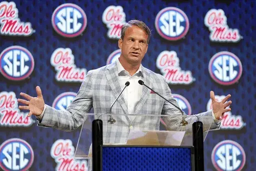 Ole Miss head football coach Lane Kiffin speaks during the Southeastern Conference NCAA college football media days Monday, July 15, 2024, in Dallas. (AP Photo/Jeffrey McWhorter)