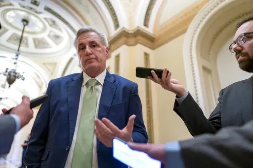 House Minority Leader Kevin McCarthy, R-Calif., talks to reporters at the Capitol in Washington, April 6, 2022. McCarthy is downplaying secretly recorded remarks he made about Donald Trump shortly after last year's attack on the Capitol. He also says he never told the then-president that he should resign — something that has not been reported. (AP Photo/J. Scott Applewhite, File)