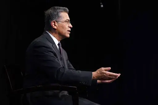 Health and Human Services Secretary Xavier Becerra, is interviewed by the Associated Press, Thursday, March 17, 2022, in Washington. (AP Photo/Jacquelyn Martin)