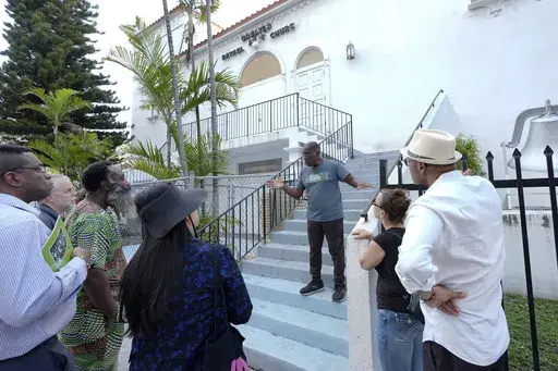 Dr. Marvin Dunn leads a tour of Overtown, a historically Black neighborhood near downtown Miami, Sunday, Feb. 25, 2024. (AP Photo/Marta Lavandier, file)