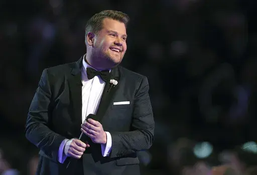James Corden hosts at the 60th annual Grammy Awards at Madison Square Garden on Jan. 28, 2018, in New York. The multiple Emmy- and Tony Award-winner who gave the world “Carpool Karaoke” is launching a new weekly show set for early 2024 on SiriusXM called “This Life of Mine with James Corden.” (Photo by Matt Sayles/Invision/AP, File)