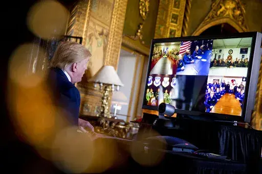 President Donald Trump speaks during a Christmas Eve video teleconference with members of the military at his Mar-a-Lago estate in Palm Beach, Fla., Tuesday, Dec. 24, 2019. A Las Vegas city councilwoman has been spending thousands on television ads in her quest to be Nevada's next governor. But Michele Fiore isn't only airing those ads to be seen by millions of Nevada voters. She's also targeting an audience of one in faraway Florida.   (AP Photo/Andrew Harnik.File)
