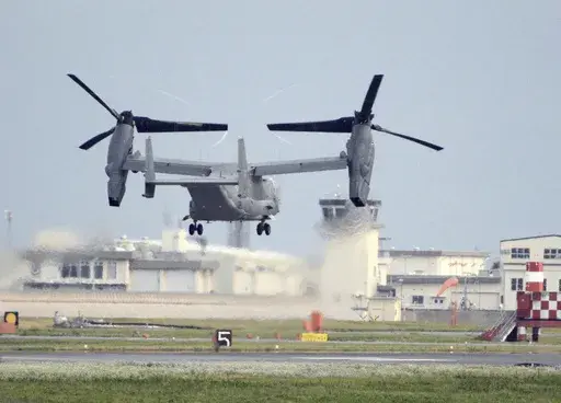 A U.S. military CV-22 Osprey takes off from Iwakuni base, Yamaguchi prefecture, western Japan, on July 4, 2018. Japanese and American military divers have spotted what could be the remains of a U.S. Air Force Osprey aircraft that crashed last week off southwestern Japan and several of the six crewmembers who are still missing, local media reported Monday, Dec. 4, 2023. (Kyodo News via AP, File)