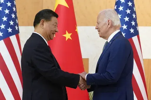 President Joe Biden, right, and Chinese President Xi Jinping shake hands before their meeting on the sidelines of the G20 summit meeting in Nusa Dua, in Bali, Indonesia on Nov. 14, 2022. The U.S. and Chinese leaders meet Wednesday while attending the annual Asia-Pacific Economic Cooperation summit in San Francisco. (AP Photo/Alex Brandon, File)