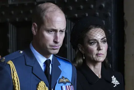 Britain's Prince William and Kate, Princess of Wales leave after they paid their respects to Queen Elizabeth II in Westminster Hall for the Lying-in State, in London, Wednesday, Sept. 14, 2022. (AP Photo/Emilio Morenatti, File)