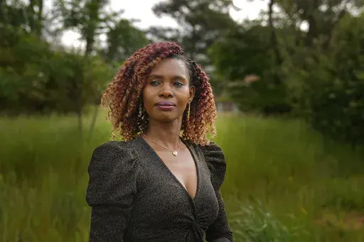 Culix Wibonele poses for a portrait on Monday, April 29, 2024, in Lawrenceville, Ga. Wibonele is a certified nursing assistant working in long-term care. (AP Photo/Brynn Anderson)