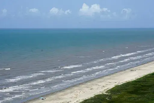 The water in the Gulf of Mexico appears bluer than usual off of East Beach, Saturday, June 24, 2023, in Galveston, Texas. (Jill Karnicki/Houston Chronicle via AP, File)
