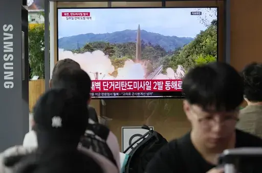 A TV screen shows a file image of North Korea's missile launch during a news program at the Seoul Railway Station in Seoul, South Korea, Wednesday, July 19, 2023. North Korea fired two short-range ballistic missiles into its eastern sea early Wednesday in what appeared to be a statement of defiance as the United States deploys a nuclear-armed submarine to South Korea for the first time in decades. (AP Photo/Ahn Young-joon)
