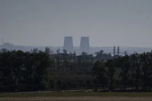 Zaporizhzhia nuclear power plant is seen from around twenty kilometers away in an area in the Dnipropetrovsk region, Ukraine, Monday, Oct. 17, 2022. A statement released Friday, May 26, 2023, by the intelligence directorate of Ukraine's Defense Ministry claimed that Russian forces would strike the Zaporizhzhia nuclear power plant, the biggest in Europe, and then report a radioactive leak in order to trigger an international probe that would pause the hostilities and give the Russian forces the r